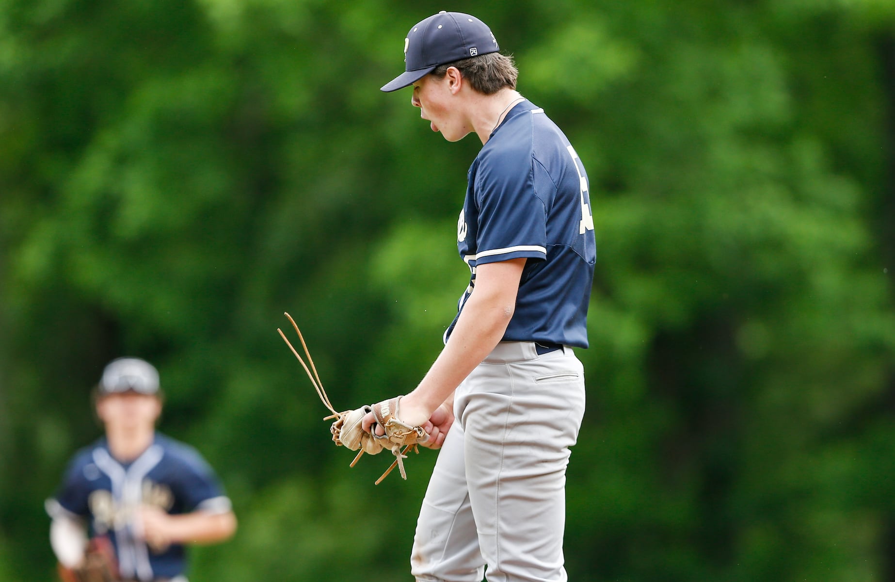 Brody Bruchner (15) of Peddie reacts after getting a strikeout for the final out of the game to win the Prep A semifinal baseball game between Hun and Peddie at The Hun School of Princeton in Princeton, NJ on 5/18/25.
