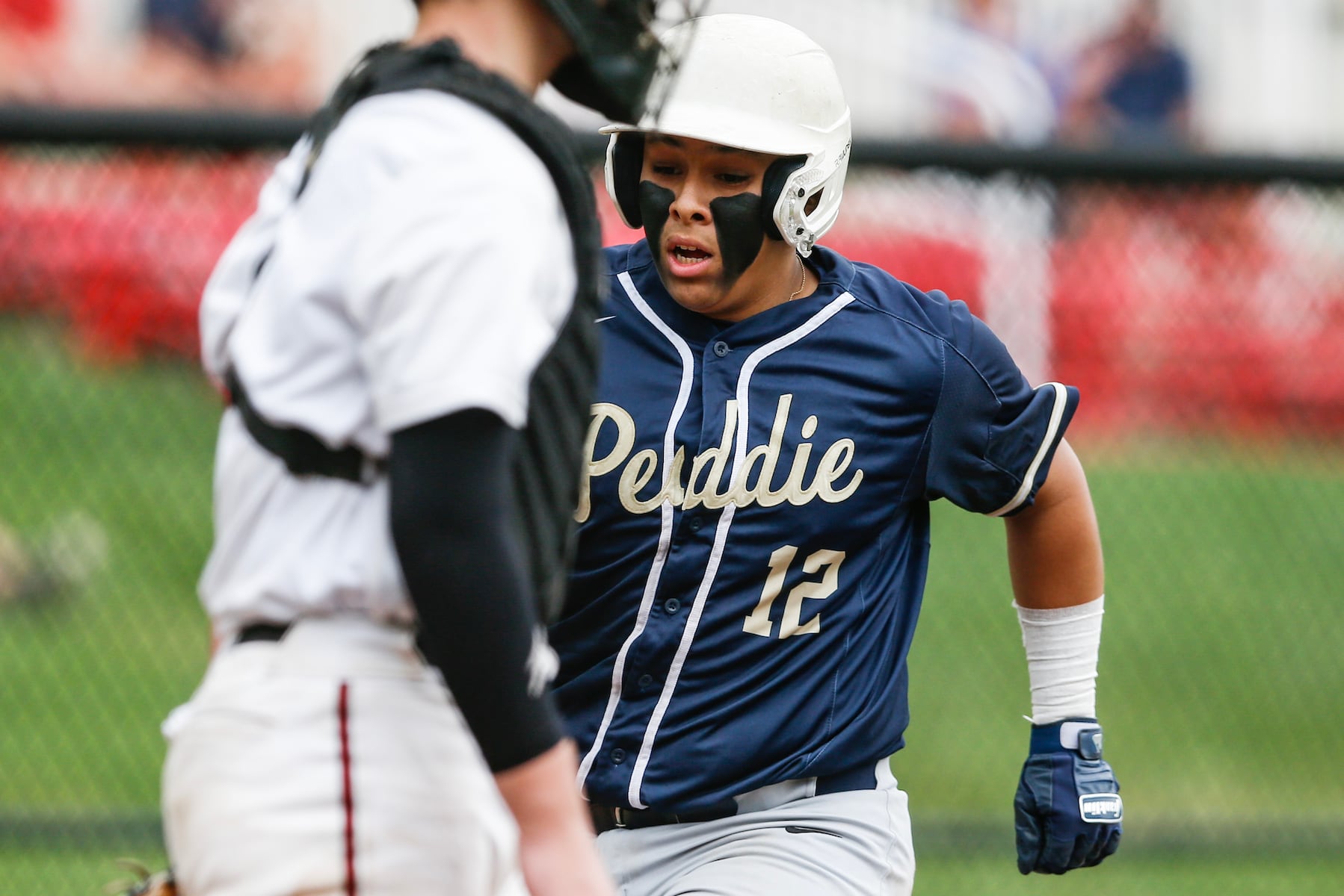 Eduard Fernandez (12) of Peddie races home to score during the Prep A semifinal baseball game between Hun and Peddie at The Hun School of Princeton in Princeton, NJ on 5/18/25.