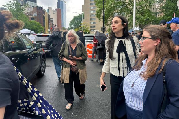 Defense attorney Teny Geragos, center, exits court during the Sean...