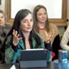 Flor Diaz Smith testifying in the Statehouse