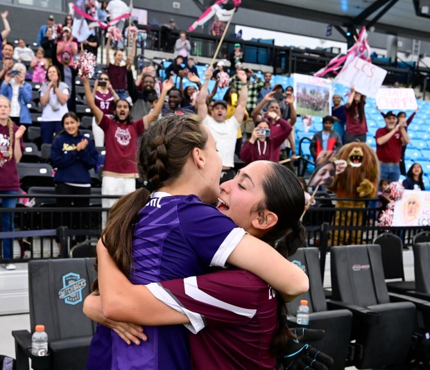Loveland Classical goalkeeper Keira Doan, left, and teammate Alexa Gonzalez celebrate after defeating the Flatirons Academy 3-0 winning the girls 2A state soccer championship game at Weidner Field in Colorado Springs, Colorado on Wednesday, May 21, 2025. (Photo by Andy Cross/The Denver Post)