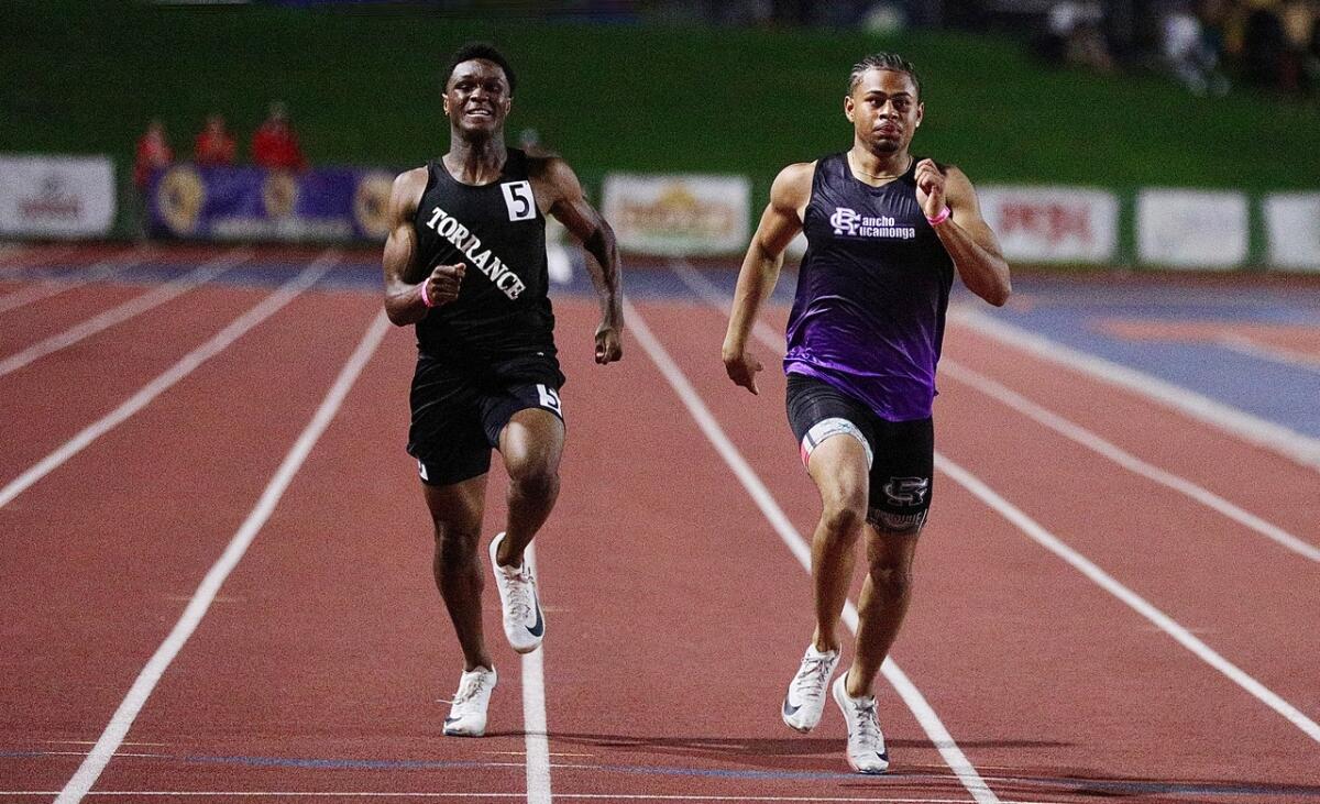 Rancho Cucamonga’s RJ Sermons, right, wins a run-off against Nicolas Obimgba.