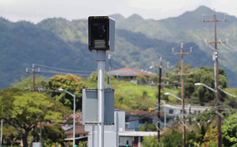 JAMM AQUINO / JAQUINO@STARADVERTISER.COM
                                A speed enforcement camera is seen near the intersection of Likelike Highway and School Street on May 9.