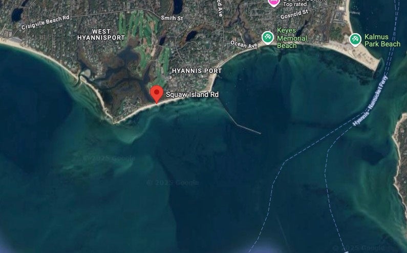 Men rescued after being found clinging to capsized boat off Cape