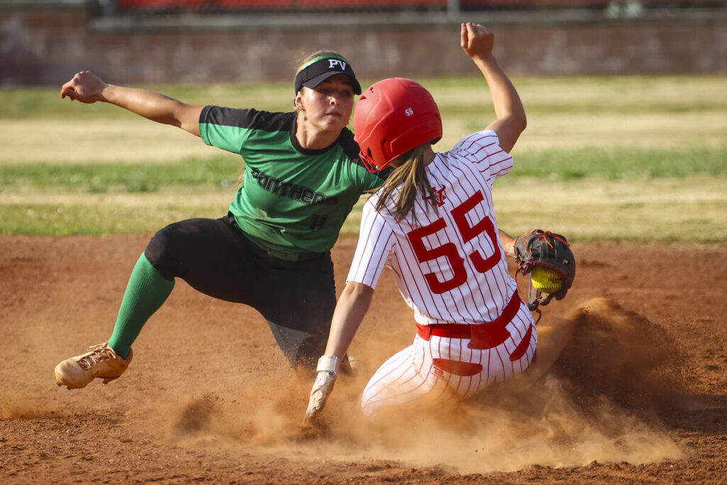 Palo Verde's Taylor Johns (11) tags out Arbor View's Lilly Easton (55) at second base during a ...