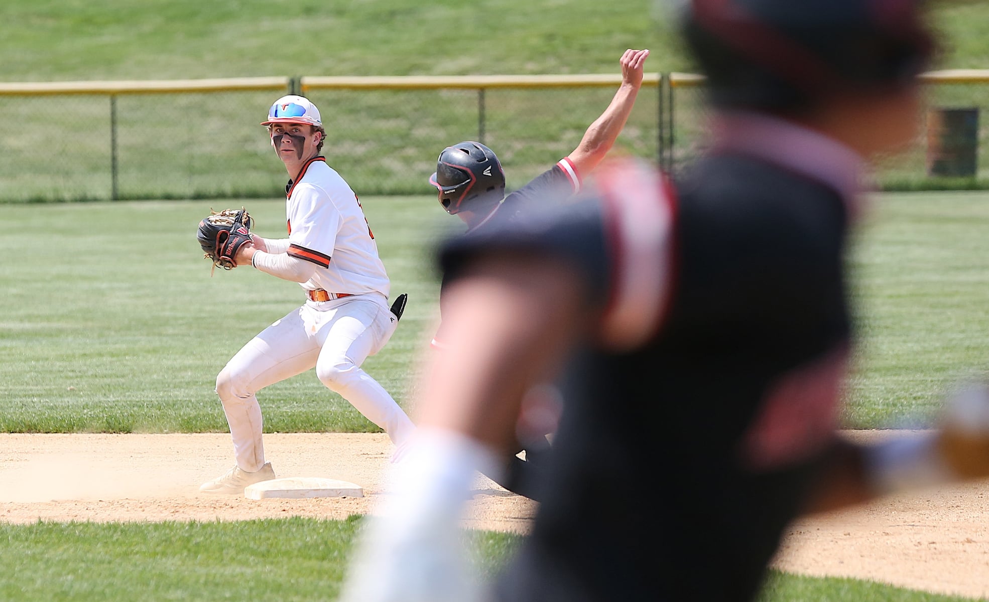 Cherokee second baseman Brett Jackson gets the force at second before firing to first during action in Tuesday's South Jersey Group 4 semifinal against Kingsway.