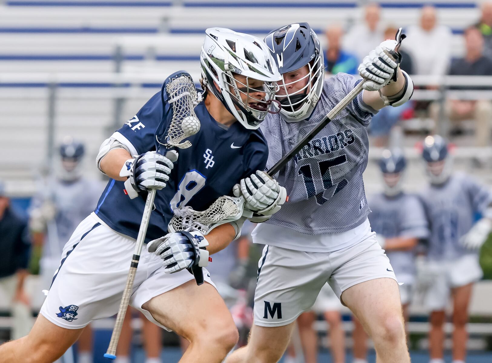 Charlie Killen (8) of Seton Hall Prep tries to battle past Pat Frost (15) of Manasquan during the boys lacrosse Kirst Cup semifinal at Kean University  in Union, NJ on Tuesday, June 17, 2025.