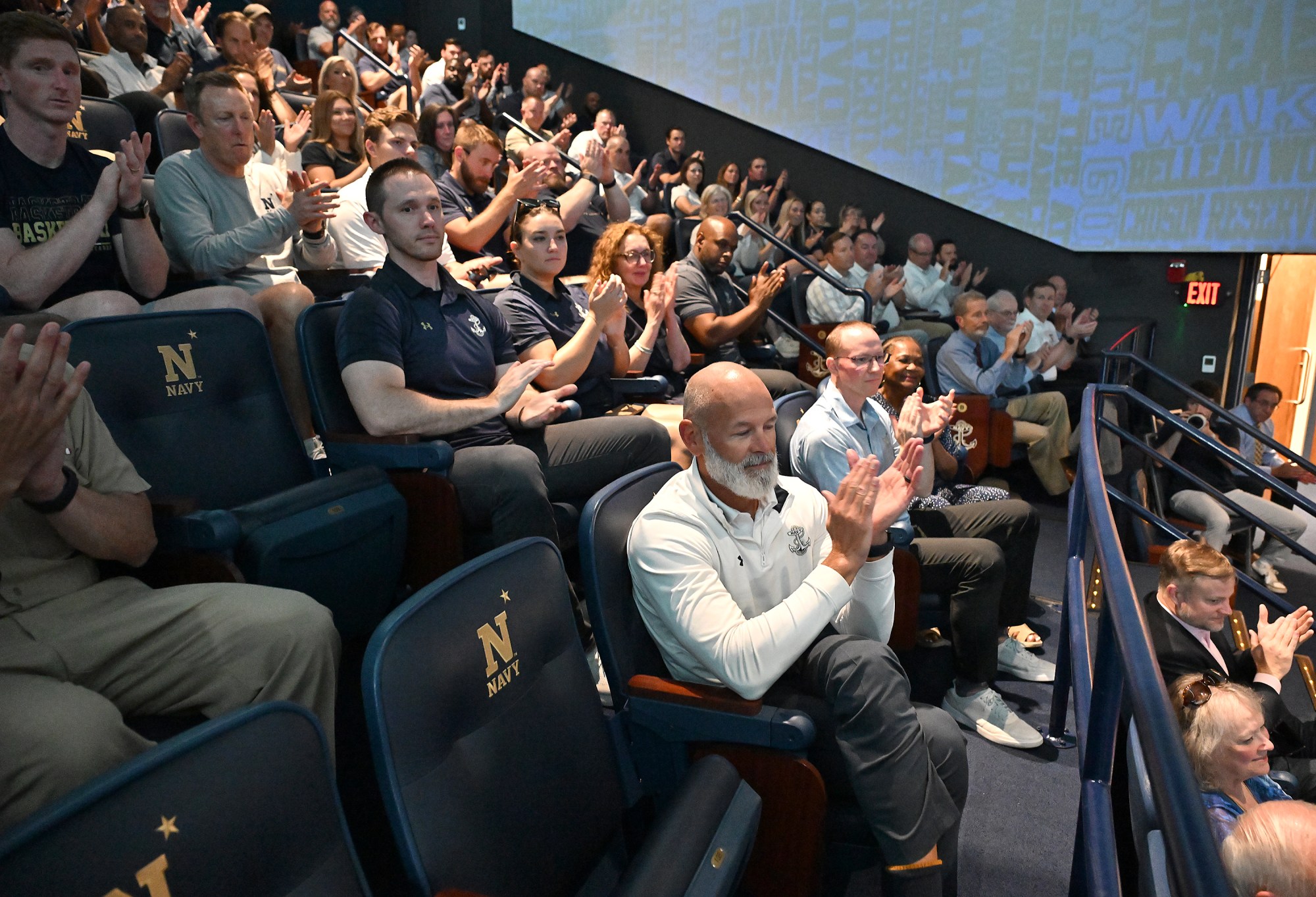 Outgoing Navy Athletic Director Chet Gladchuk said his goodbyes to staff today and introduced new Navy athletic director Michael Kelly during an event at academy. (Paul W. Gillespie/Staff)