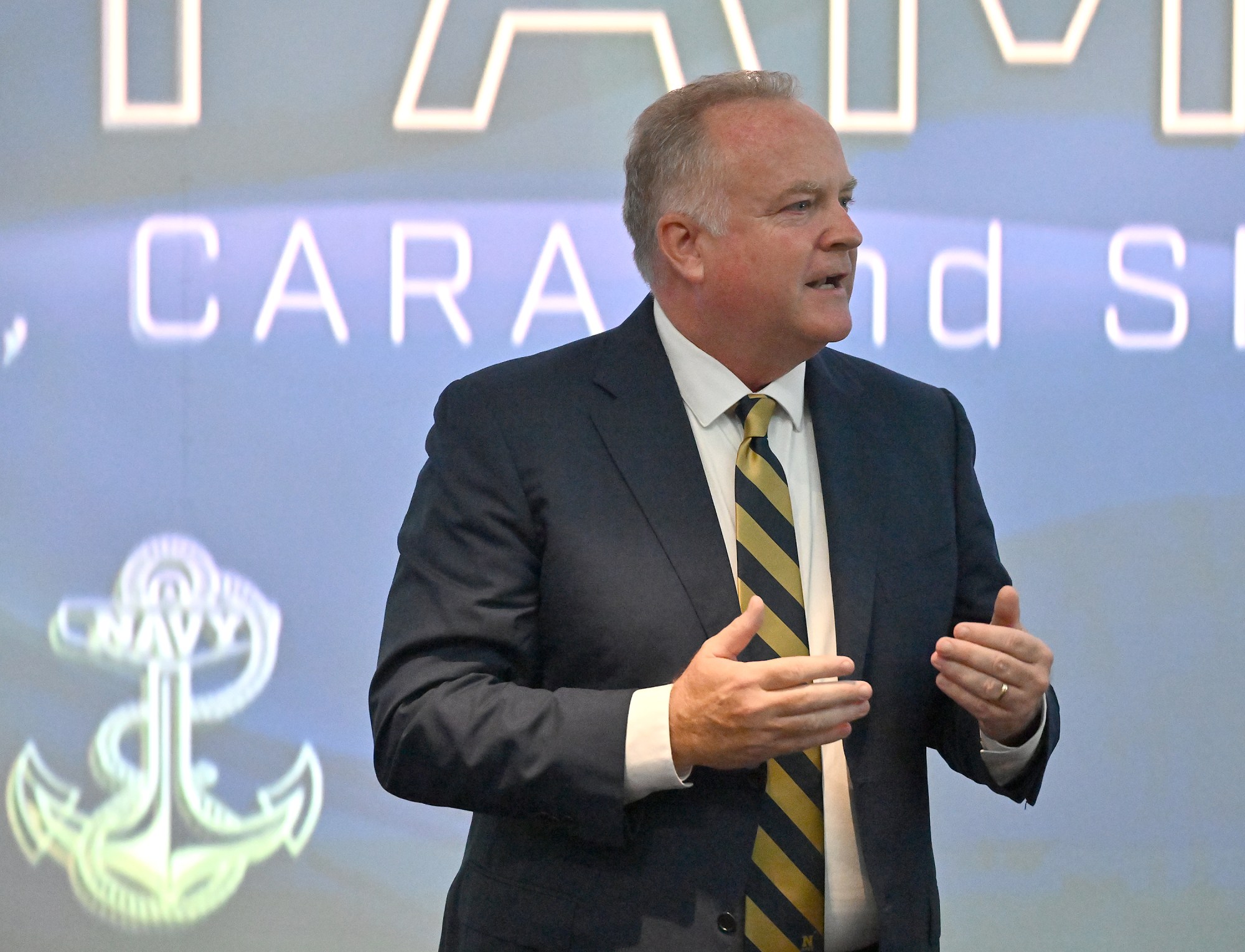 New Athletic Director Michael Kelly gives remarks. Outgoing Navy Athletic Director Chet Gladchuk said his goodbyes to staff today and introduced new Navy athletic director Michael Kelly during an event at academy. (Paul W. Gillespie/Staff)