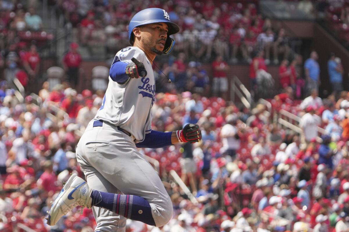 Mookie Betts runs the bases after hitting a solo home run for the Dodgers in the seventh inning Sunday.