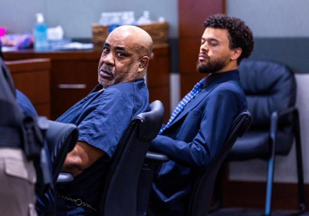 Duane Davis looks back during a hearing 