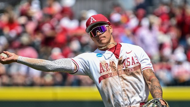 Arkansas infielder Wehiwa Aloy (9) against North Dakota State during an NCAA regional baseball game on Friday, May 30, 2025, in Fayetteville, Ark. (AP Photo/Michael Woods)