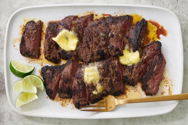 Spicy green curry steak. Marinate skirt steak in Thai green curry paste, sear it in your cast-iron pan, and then serve with lime butter and wedges. Food styled by Rebecca Jurkevich. (Kelly Marshall/The New York Times)