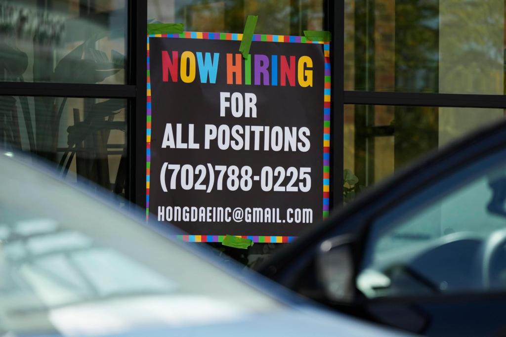 US applications for jobless benefits rise, but layoffs historically low