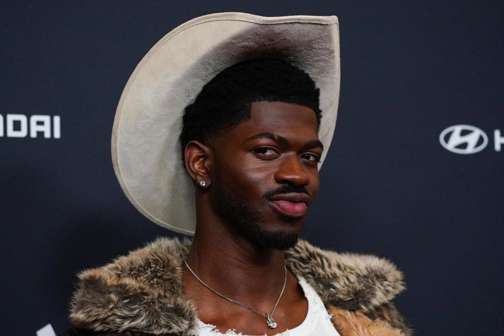 Lil Nas X charged with attacking police officers as he walked naked