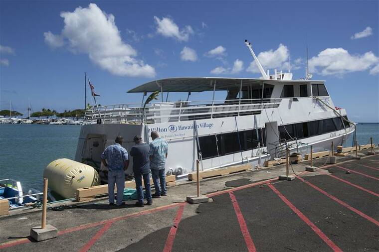 Atlantis boat removed from Kewalo Basin after grounding