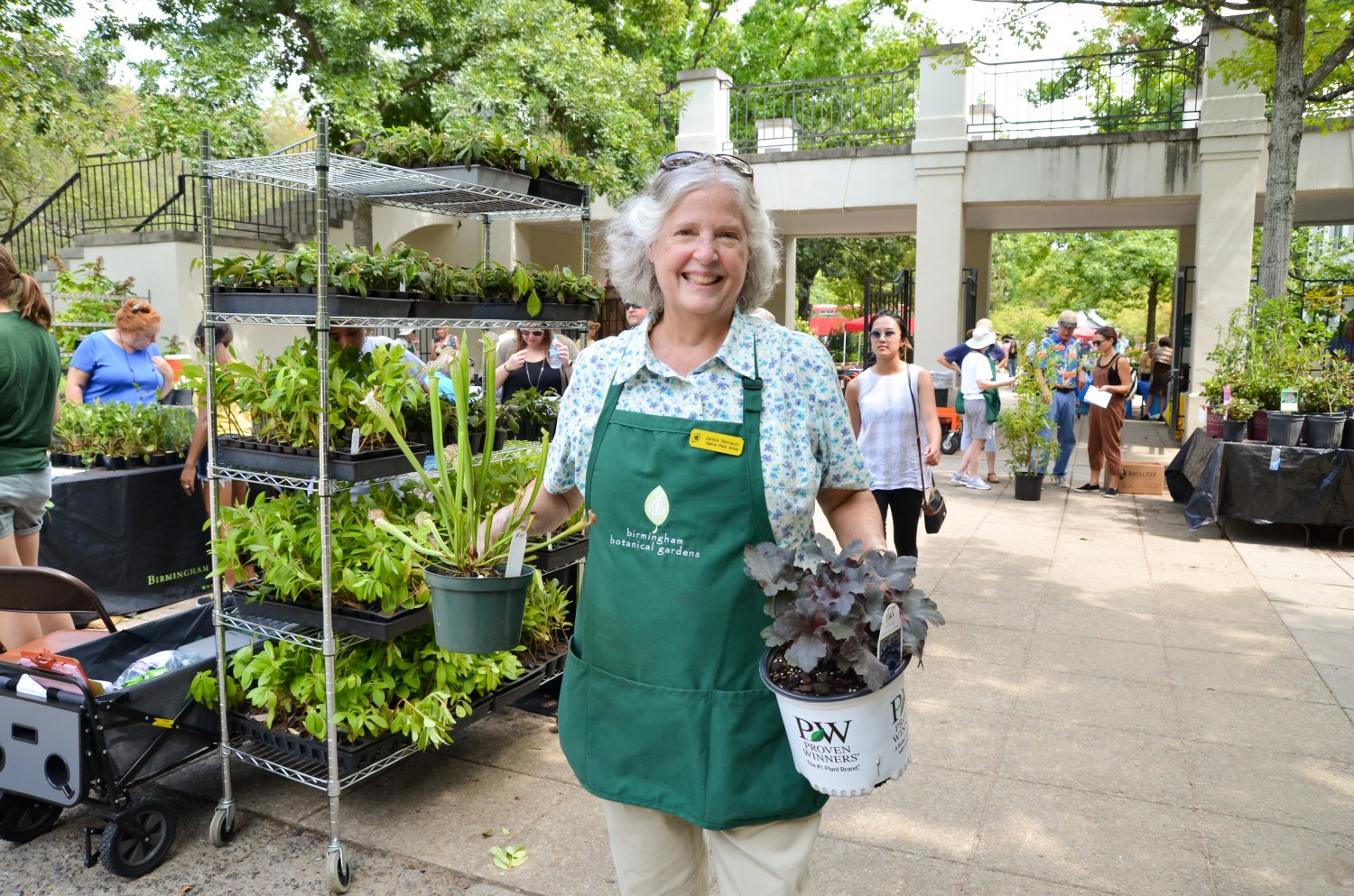 Woman with plants at BIrmingham Botanical Gardens Plant Sale