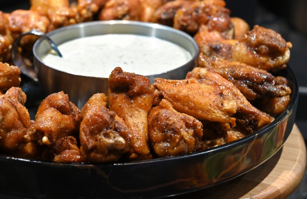 Sticky Blackbird wings at M&T Bank Stadium is one of the food items available this year. (Lloyd Fox/Staff)