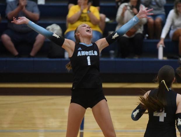 Joliet Catholic's Emma Beattie (1) celebrates the Angles victory over Providence during a nonconference match Thursday, Sept. 18, 2025 in Joliet, IL. (Steve Johnston/for the Daily Southtown)