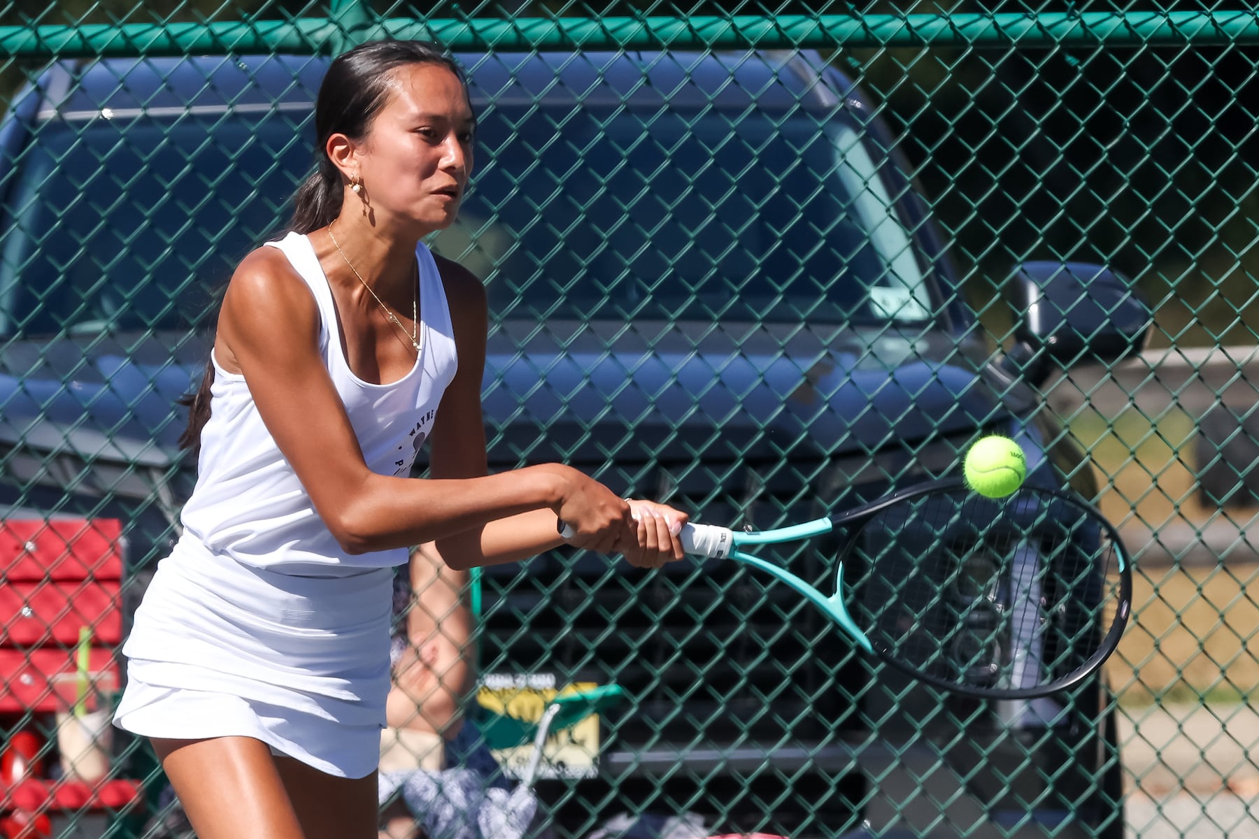 Emma Grealy of Wayne Hills returns a shot against Passaic Tech during the third singles match of the girls tennis Passaic County Final at Hershfield Park in Pompton Lakes, NJ on Friday, September 19, 2025.