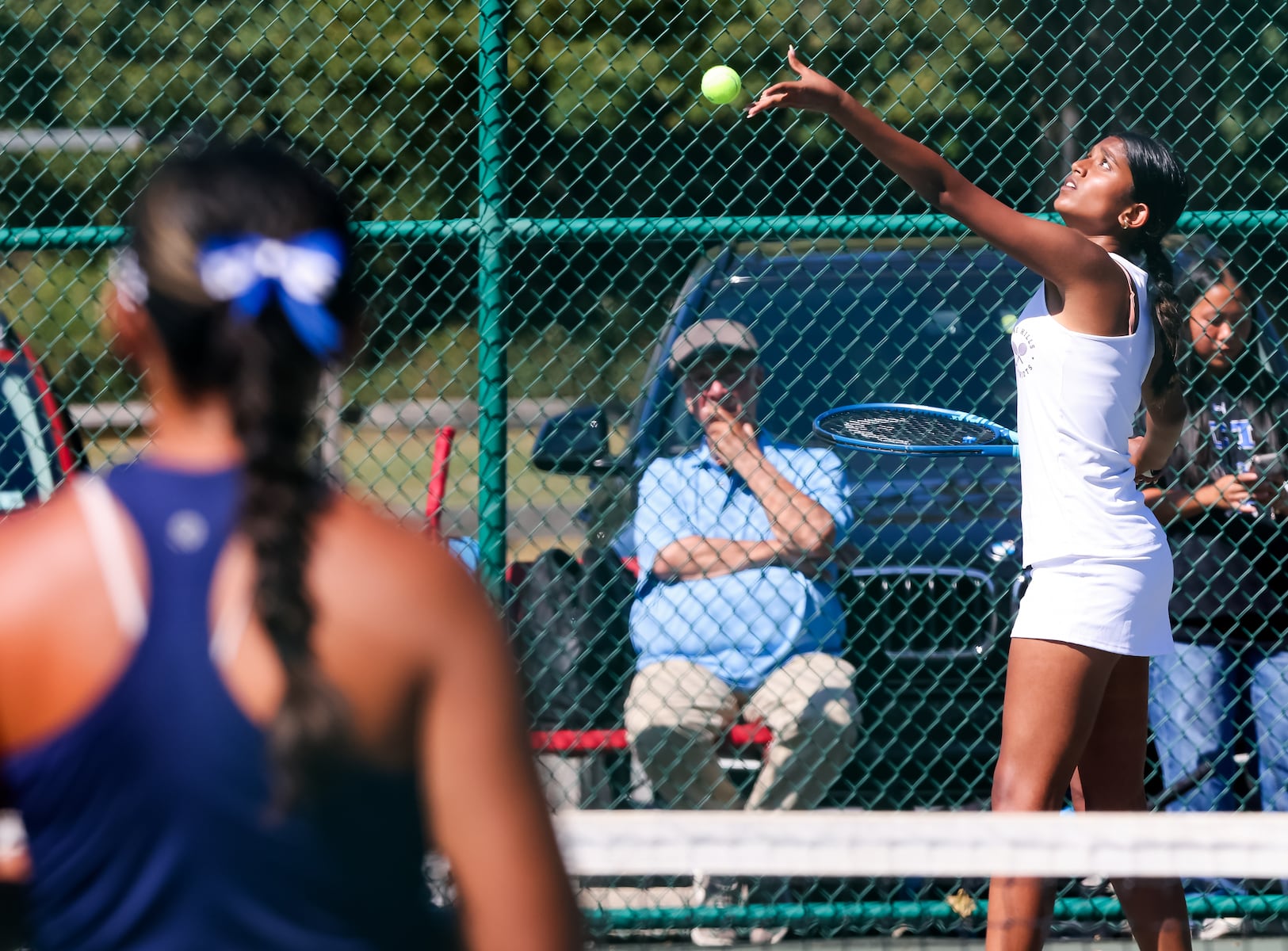 Aishwarya Sundarmurthy of Wayne Hills serves the ball against Passaic Tech during the second doubles match of the girls tennis Passaic County Final at Hershfield Park in Pompton Lakes, NJ on Friday, September 19, 2025.