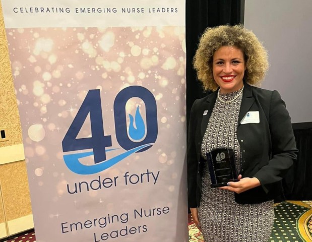 East Leyden High School graduate Angelina Fakhoury-Siverts will be inducted into the Leyden High School District 212 Wall of Fame on Thursday. She was the school's first female football player as the team's placekicker in 2001 and has since gone on to earn recognition as a leader in the nursing profession. (Leyden High School District 212)