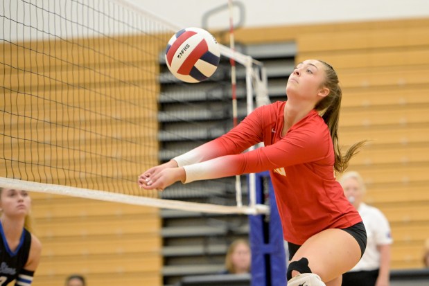 Batavia's Morgan Raiser (10) sets up ball against St. Charles North during a DuKane conference game in St. Charles on Tuesday, Sept. 23, 2025. (Mark Black / for the Beacon-News)