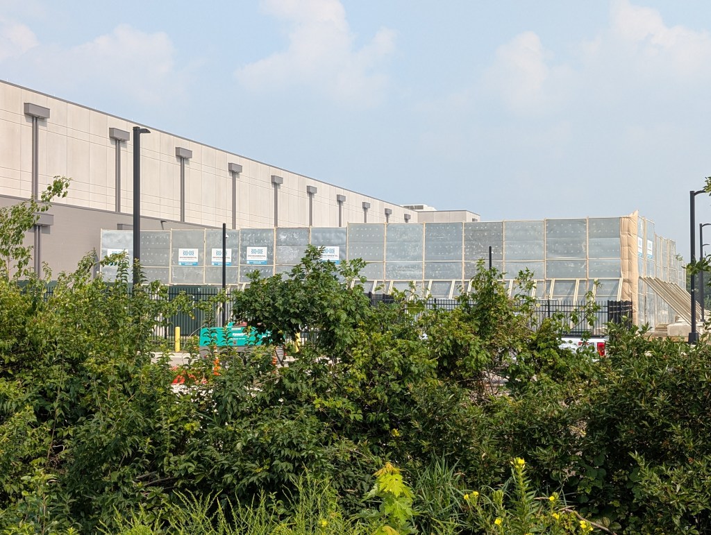 Aurora temporarily pauses data center, warehouse approvals