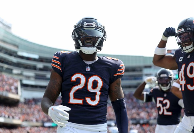 Bears cornerback Tyrique Stevenson celebrates scoring the winning touchdown on an interception return against the Titans on Sept. 8, 2024, at Soldier Field. (Brian Cassella/Chicago Tribune)