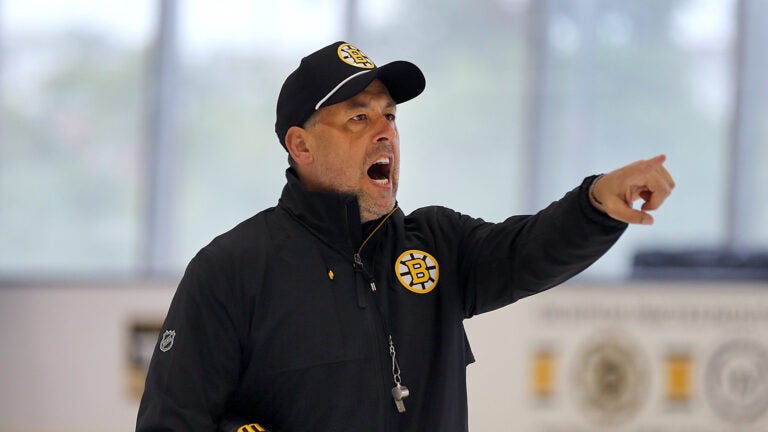 The Boston Bruins held training camp Thursday at the Warrior Ice Arena. Bruins coach Marco Sturm gives instruction during a drill.