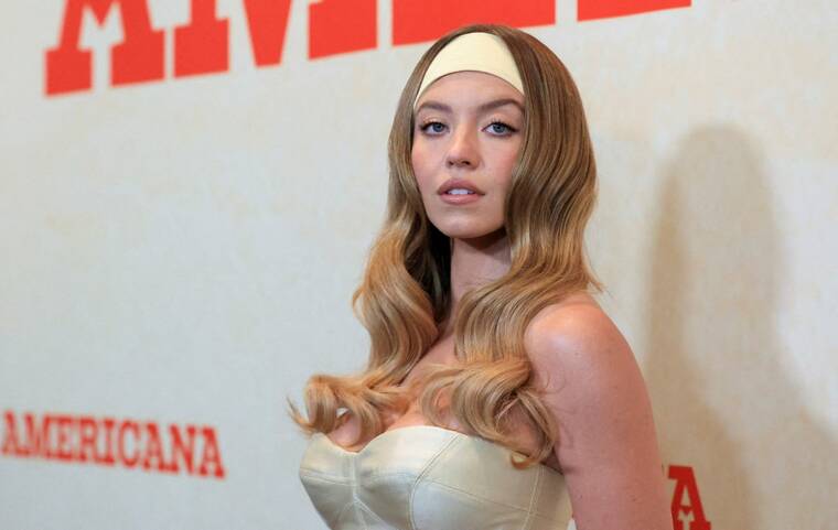 REUTERS/MARIO ANZUONI/FILE PHOTO
                                Cast member Sydney Sweeney attends a special screening for the film Americana in Los Angeles, Calif., on Aug. 3. American Eagle Outfitters shares surged 26% in premarket trading today, fueled by renewed shopper interest in the retailer following a controversial jeans ad campaign featuring actor Sydney Sweeney.
