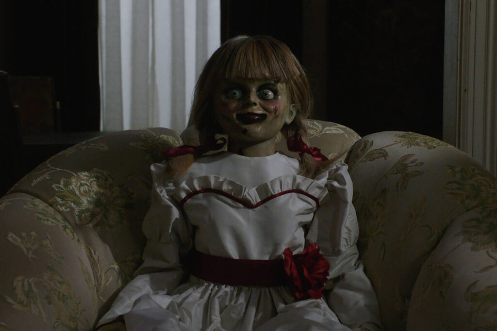 This photo released by Warner Bros. Pictures shows the Annabelle doll in a scene from New Line ...