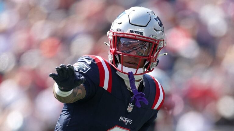 FOXBOROUGH, MASSACHUSETTS - SEPTEMBER 28: Christian Gonzalez #0 of the New England Patriots signals against the Carolina Panthers during the first quarter in the game at Gillette Stadium on September 28, 2025 in Foxborough, Massachusetts.