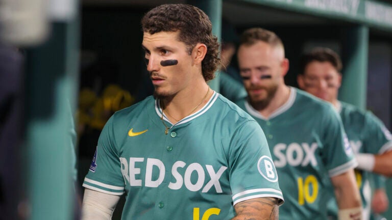 Jarren Duran #16 of the Boston Red Sox and Trevor Story #10 in their dugout after the 4-1 loss to the New York Yankees during MLB action on Friday September 12, 2025.