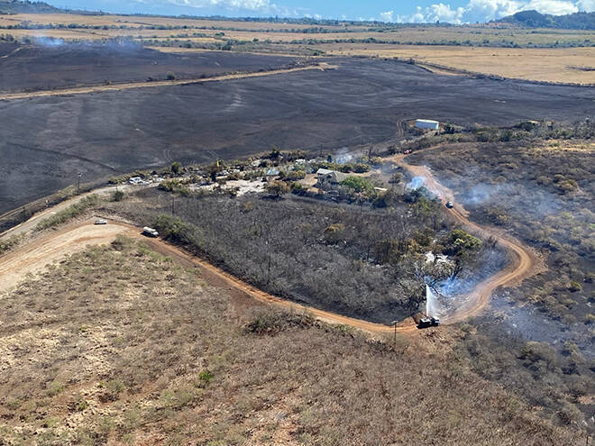 COURTESY MFD
This aerial photo from the Maui Fire Department shows some of the area burned by the Holomua wildfire this week. One home was threatened, but not damaged, by the blaze.