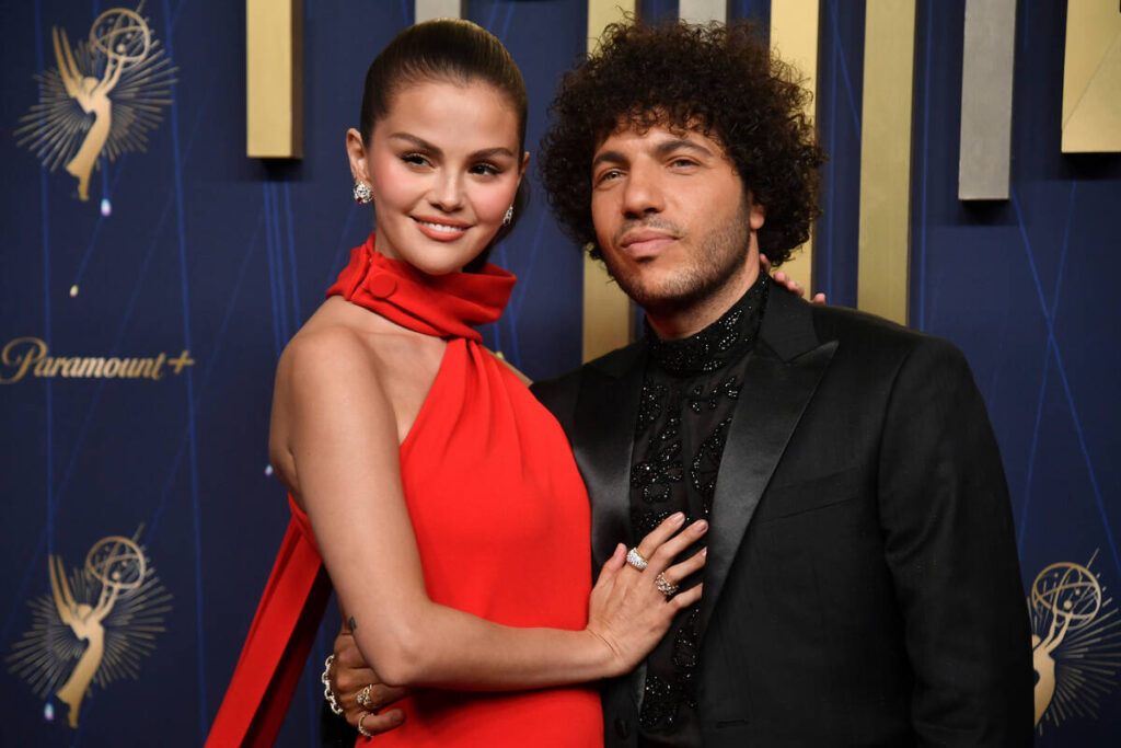 Selena Gomez, left, and Benny Blanco arrive at the 77th Primetime Emmy Awards on Sunday, Sept. ...