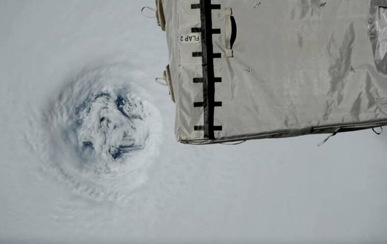 NASA VIA REUTERS
International Space Station flies over the eye of Typhoon Ragasa, today, in this still image obtained from social media video.