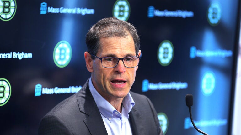 The Bruins training camp opened on Wednesday at Warrior Ice Arena. GM Don Sweeney and coach Jim Montgomery spoke to the media. Sweeney speaks at the podium.