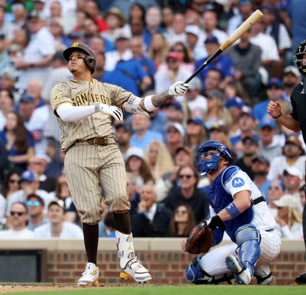 San Diego Padres third baseman Manny Machado hits a 2-run home run off of Chicago Cubs relief pitcher Shota Imanaga in the fifth inning of Game 2 of the NL wild-card series at Wrigley Field on Oct. 1, 2025. (Chris Sweda/Chicago Tribune)