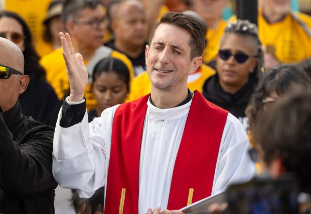 Fr. David Inczauskis (CQ) prays during the Coalition for Spiritual...