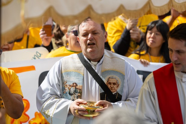 Fr. Leandro Fossa (CQ) worships during the Coalition for Spiritual...