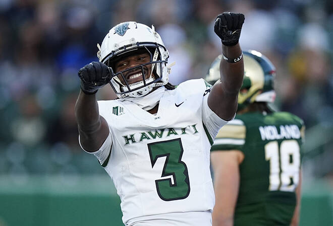 RON CHENOY / IMAGN IMAGES
Hawaii wide receiver Nick Cenacle celebrates his touchdown scored in the first quarter today against the Colorado State Rams at Sonny Lubick Field at Canvas Stadium in Fort Collins, Colo.
