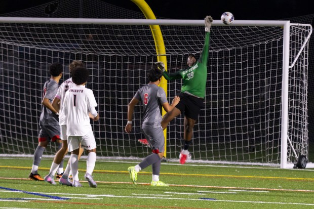 Glen Burnie goalkeeper Samuel Akinwande makes a save during the showdown between Glen Burnie and North County High Schools at Glen Burnie High School in Glen Burnie, MD. (Haldan Kirsch/Freelance)