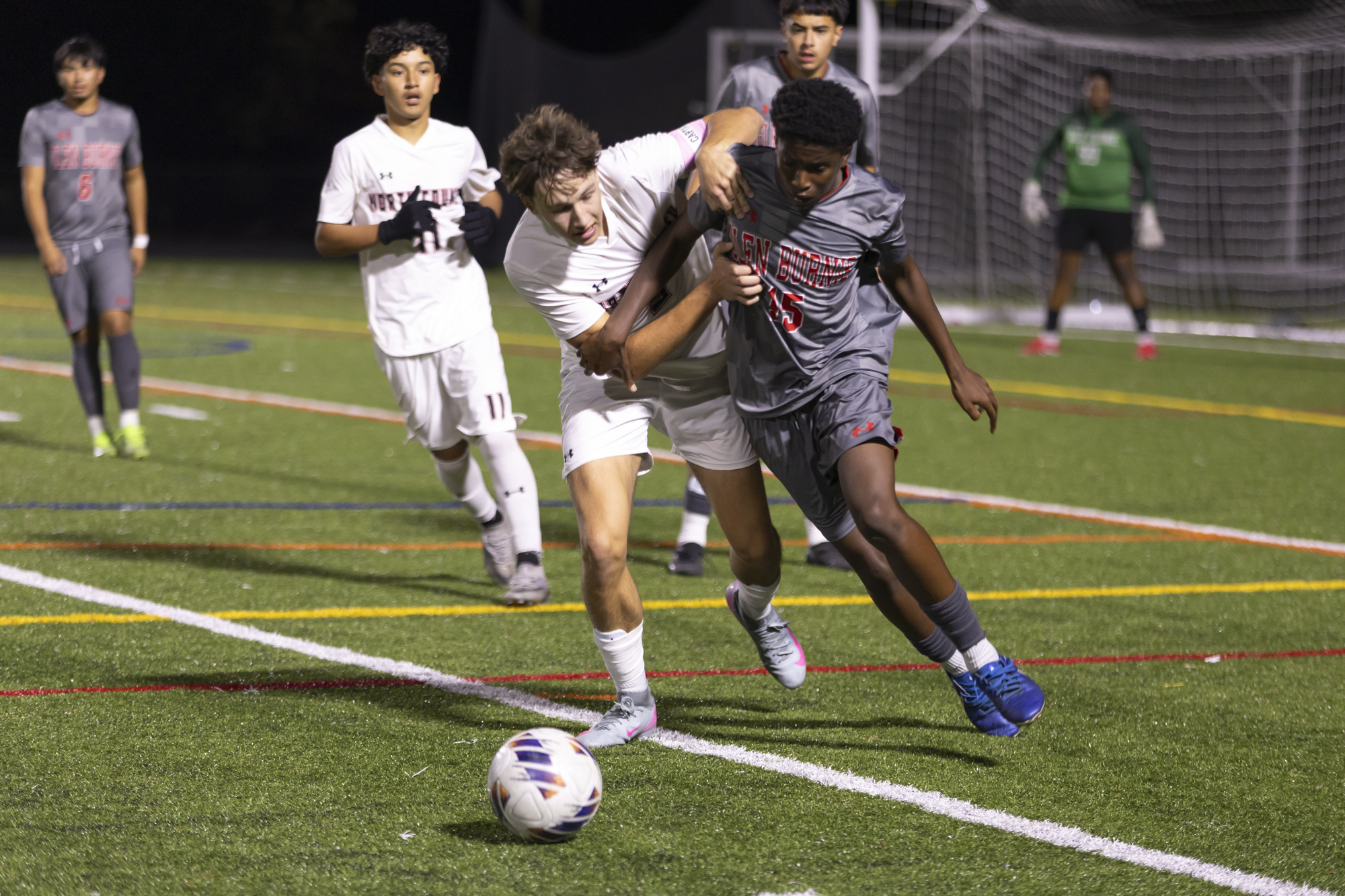 Tyler Ray, left, and Dominic Tamn Jong fight for possession...