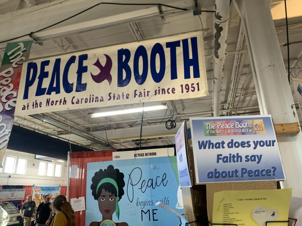 A Booth at the State Fair Urges Attendees to Give Peace a Chance