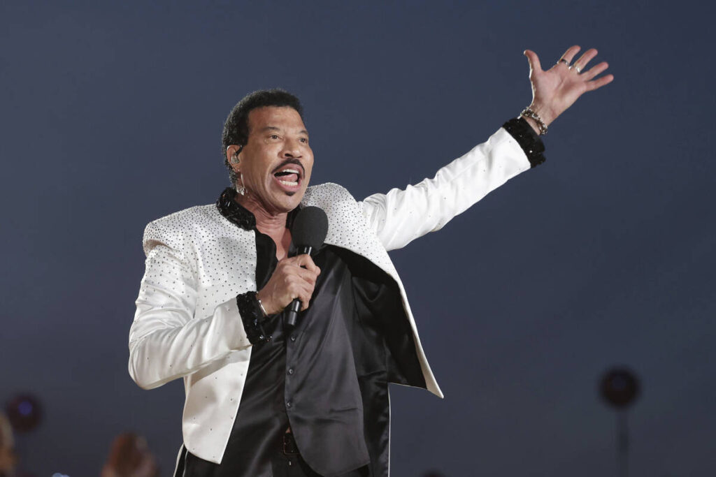 Lionel Richie performs during a concert at Windsor Castle in Windsor, England, Sunday, May 7, 2 ...