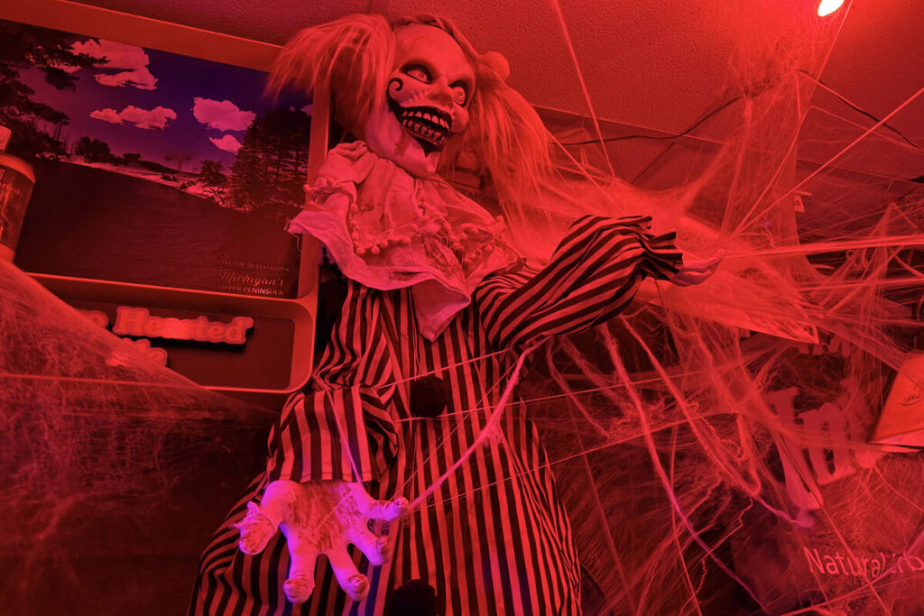 With red lighting and thousands of props, The Silver Stamp bar in downtown Las Vegas transforms ...