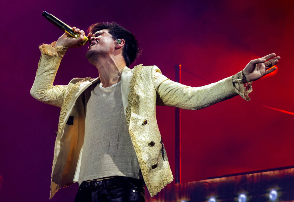 Lead singer Brendon Urie from Panic! At The Disco performs with the band on the 7-Eleven stage ...