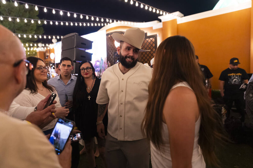 Mexican star Carin León greets supporters and friends following the announcement for his c ...
