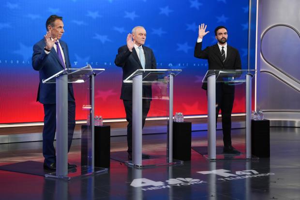From left, Independent candidate former New York Gov. Andrew Cuomo, Republican candidate Curtis Sliwa and Democratic candidate Zohran Mamdani participate in a mayoral debate, Thursday, Oct. 16, 2025, in New York. (AP Photo/Angelina Katsanis, Pool)